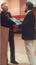 Bob Schul (L) receives Hall of Fame plaque from Harold Tinsley