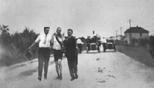 Thomas J Hicks (middle being assisted during 1904 Olympic marathon)